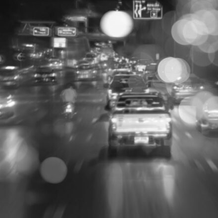 Blurred of traffic jam in rainy day with bokeh light. Bangkok Thailand